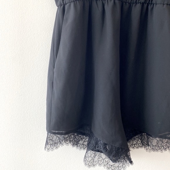 BCBGeneration Tie Strap Lace Trim Romper in Black - Picture 5 of 10